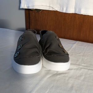 Woman’s grey canvas slip on sneakers